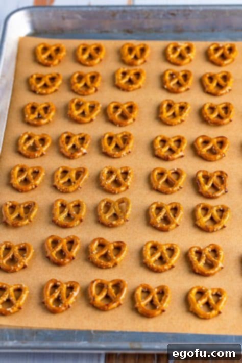 Pretzels on a lined cookie sheet.