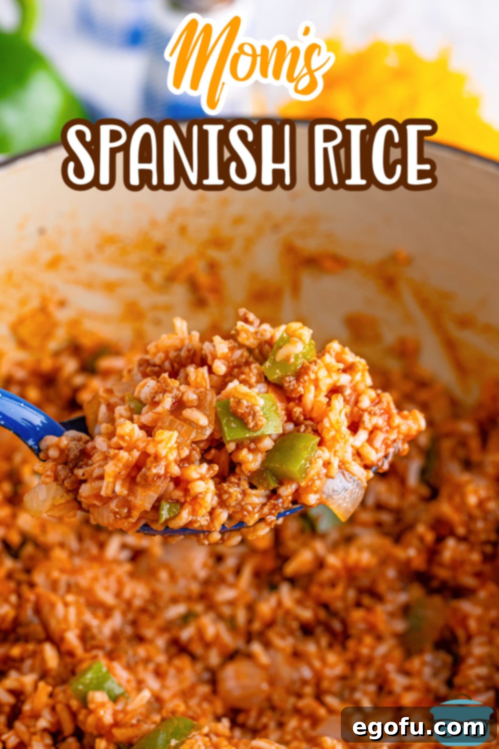 Homemade Spanish Rice 3 A blue serving spoon holding a scoop of Spanish Rice over a pot, showcasing the hearty texture.