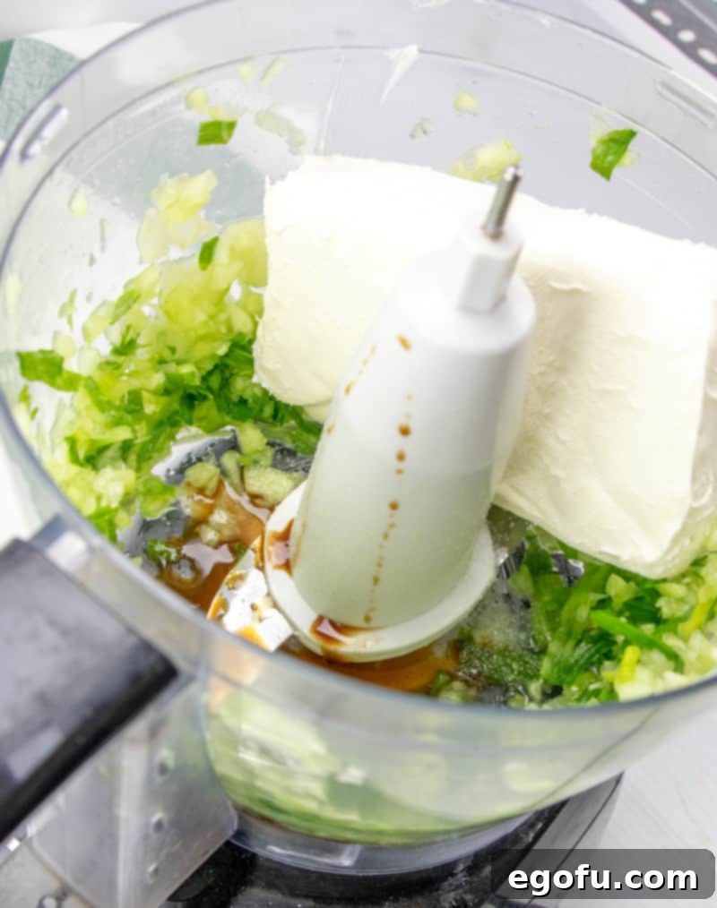 softened cream cheese, Worcestershire sauce and salt added to food processor bowl.