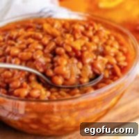 Hearty Comfort Baked Beans 9 A big glass bowl of Southern Baked Beans.