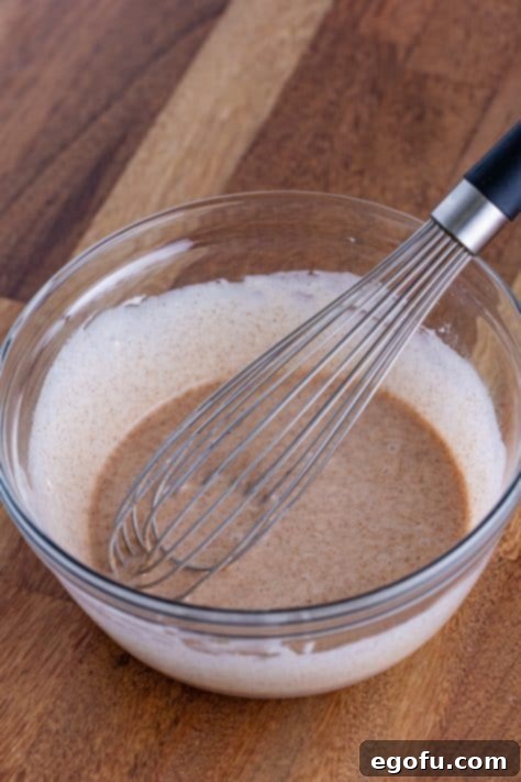 Buttery Cinnamon Raisin Biscuits 16 Powdered sugar, milk, vegetable oil and cinnamon in a small bowl.