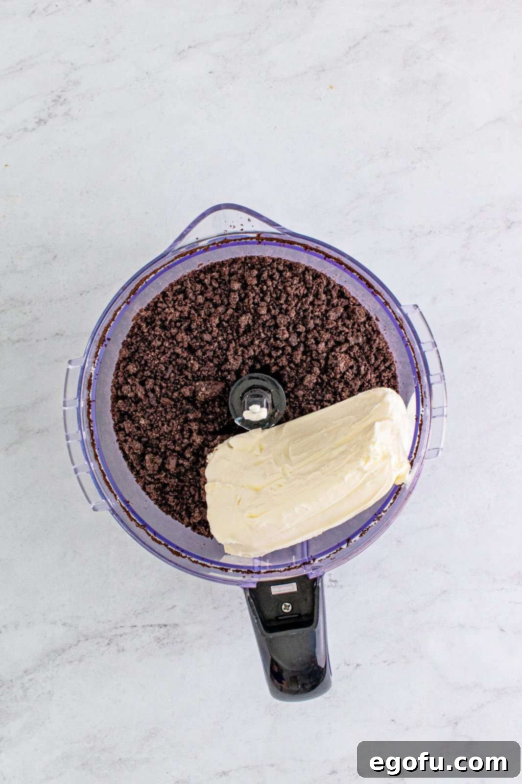 cream cheese added to ground Oreo cookies.