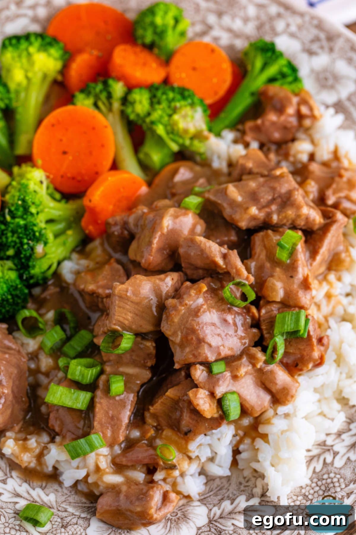 Looking down on Crock Pot Beef Tips and Gravy, showcasing the tender beef and rich gravy.