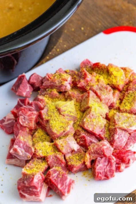 Cut up beef with lemon pepper seasoning.