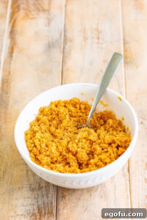 Golden Banana Dream Pie 16 Crushed Nilla wafers mixed with melted butter in a bowl, then pressed firmly into a pie pan.