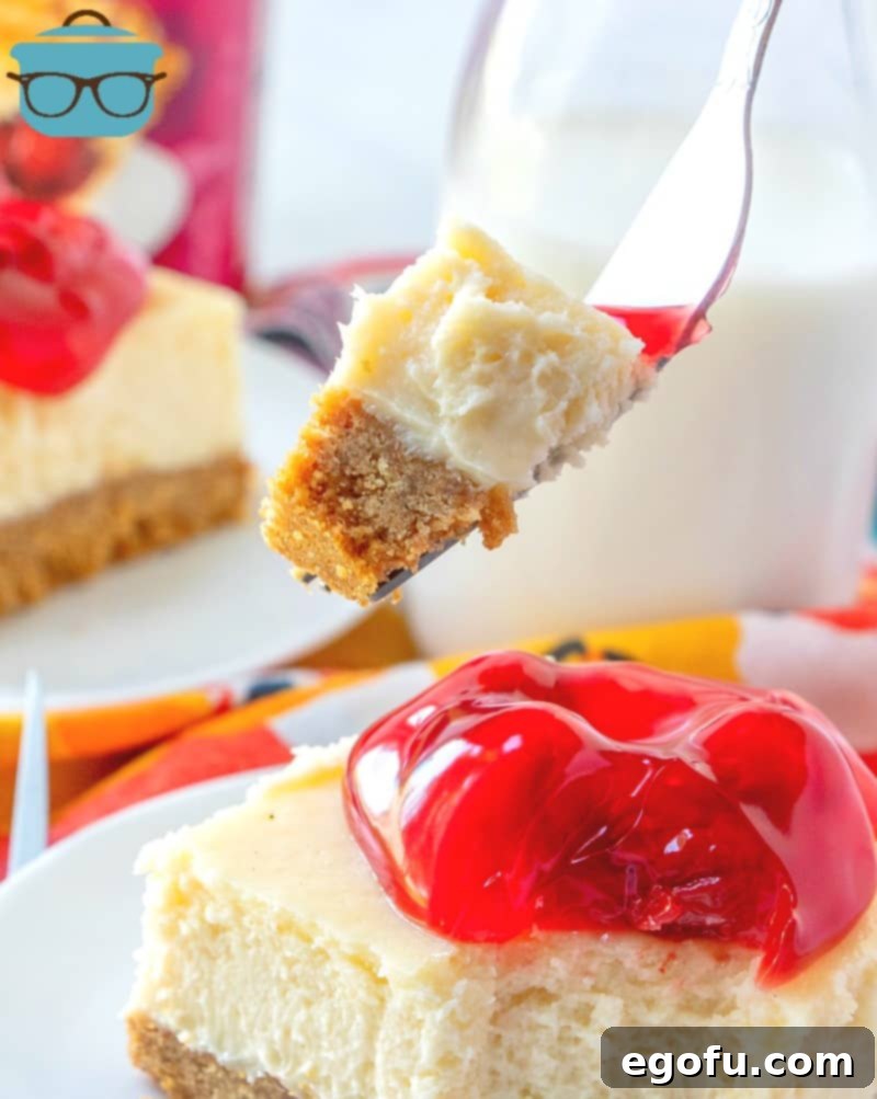 A delectable forkful of cheesecake with a charming vintage bottle of milk blurred in the background, evoking a sense of nostalgic comfort.