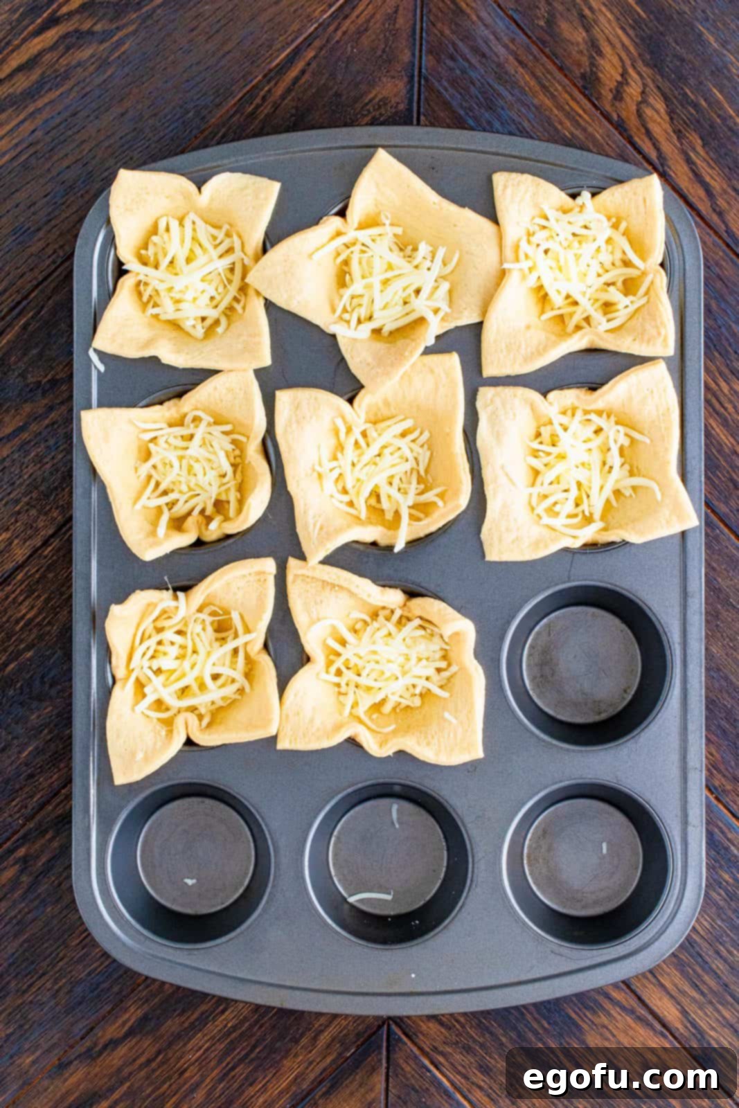 Cheese added to bottom of crescent squares.