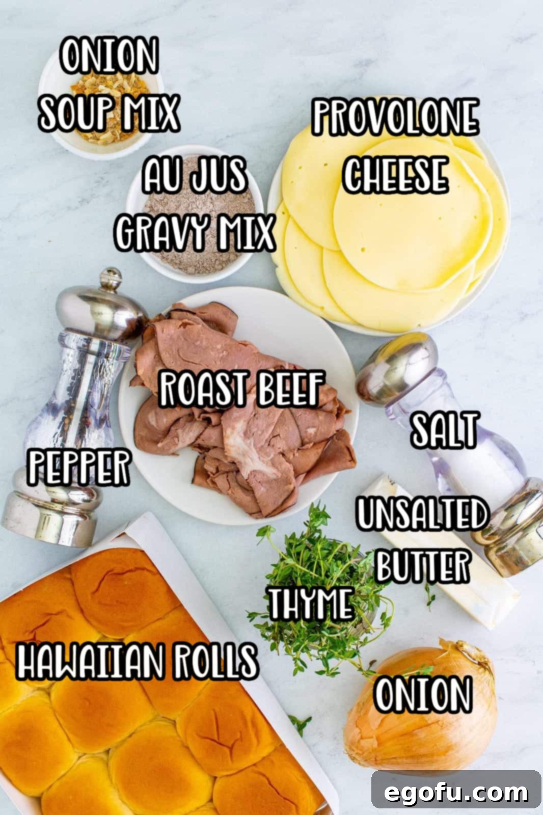 Thyme, salt and pepper added to onions in pan.