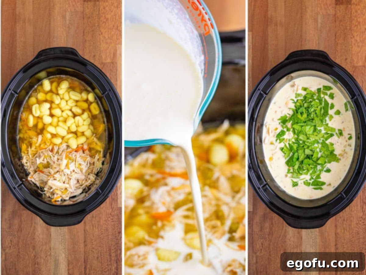 Creamy Slow Cooker Olive Garden Chicken Gnocchi Soup 7 Shredded chicken and gnocchi in a crock pot with heavy cream and spinach being added to the soup.