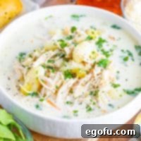 Creamy Slow Cooker Olive Garden Chicken Gnocchi Soup 9 Looking down on a bowl of Crock Pot Olive Garden Chicken Gnocchi Soup.
