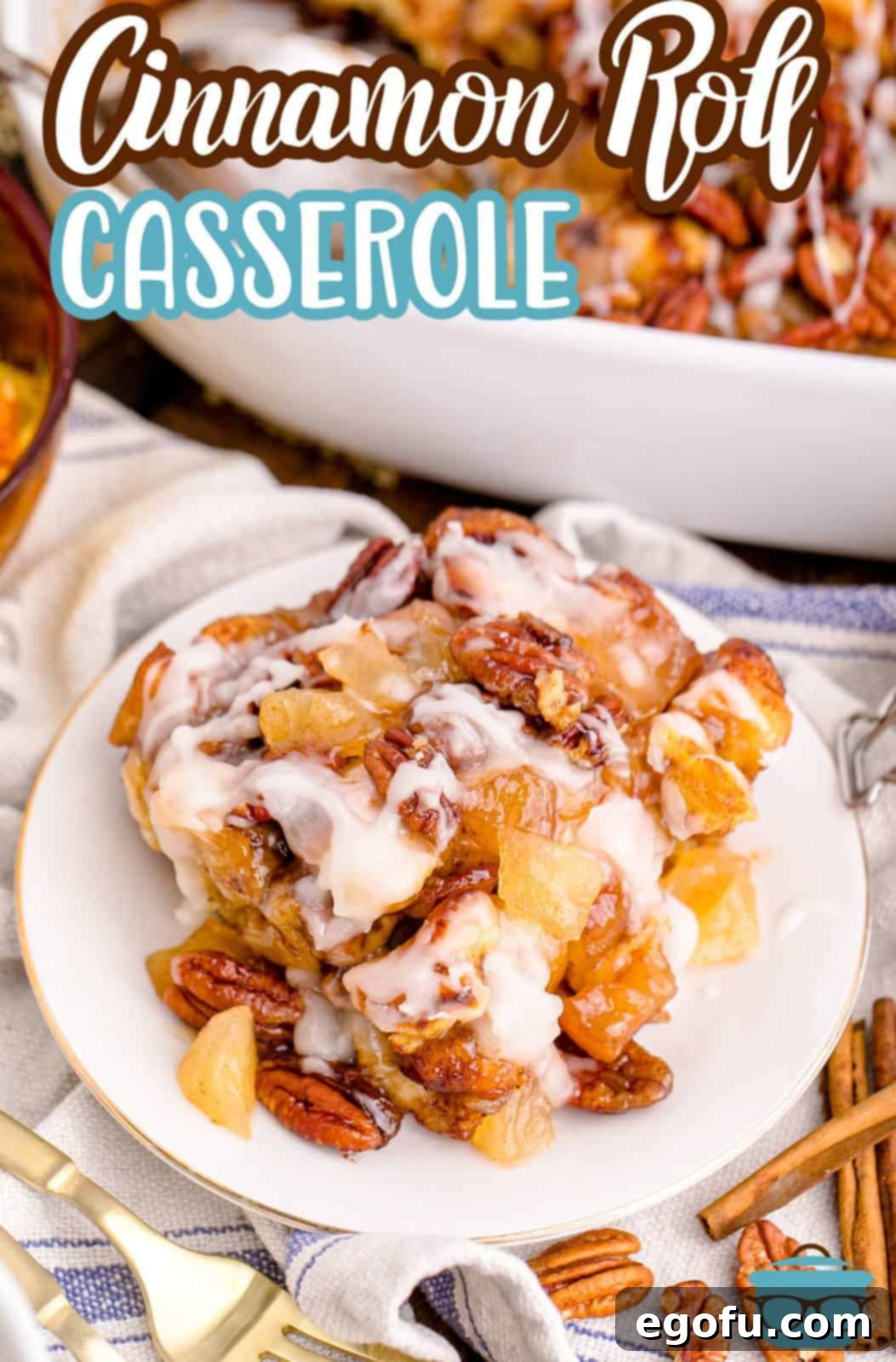 Gooey Cinnamon Roll Delight 3 Pinterest image of Cinnamon Roll Casserole on white plate next to casserole dish.