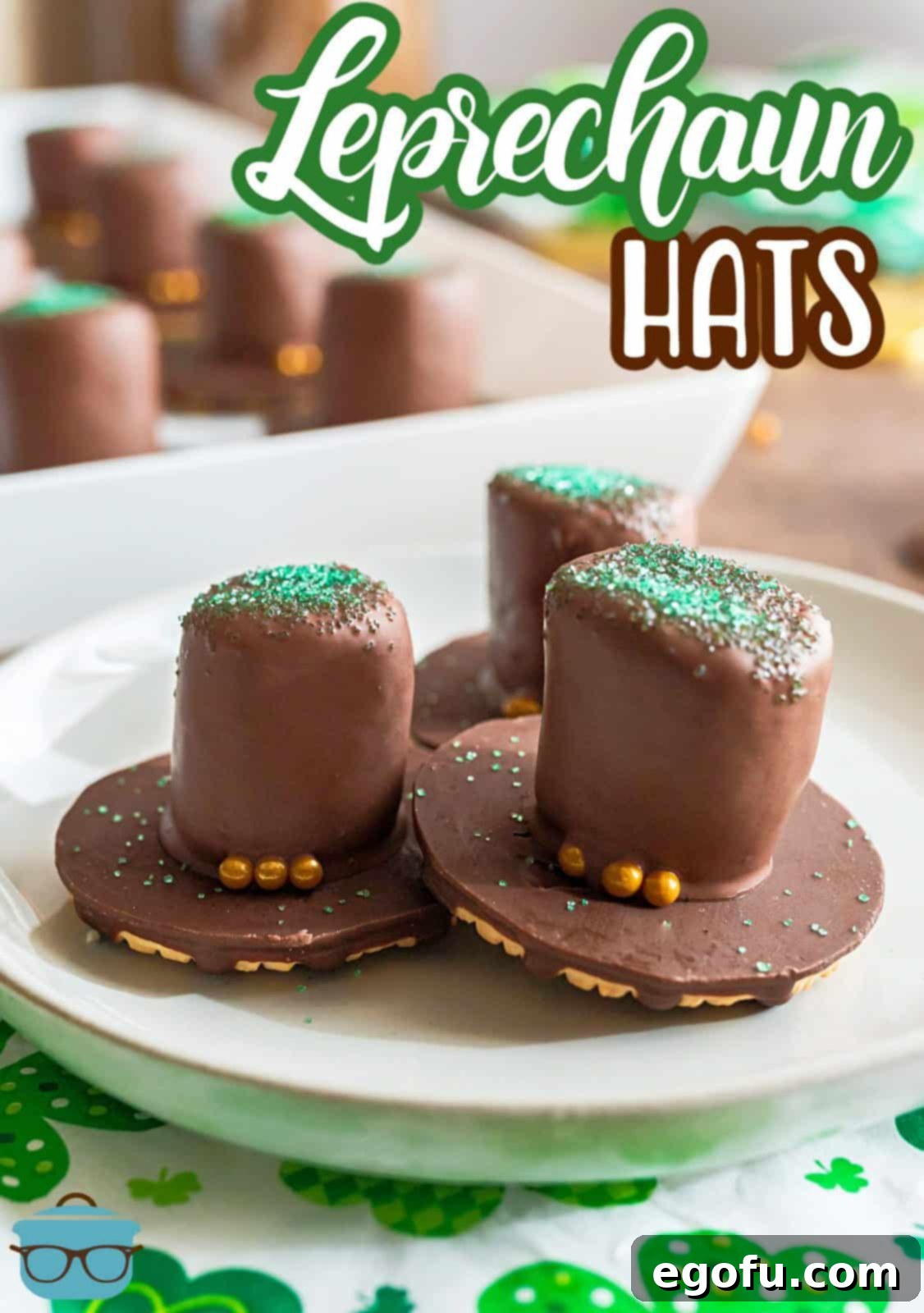 Three St. Patrick's Day Leprechaun Hats on white plate pinterest image.