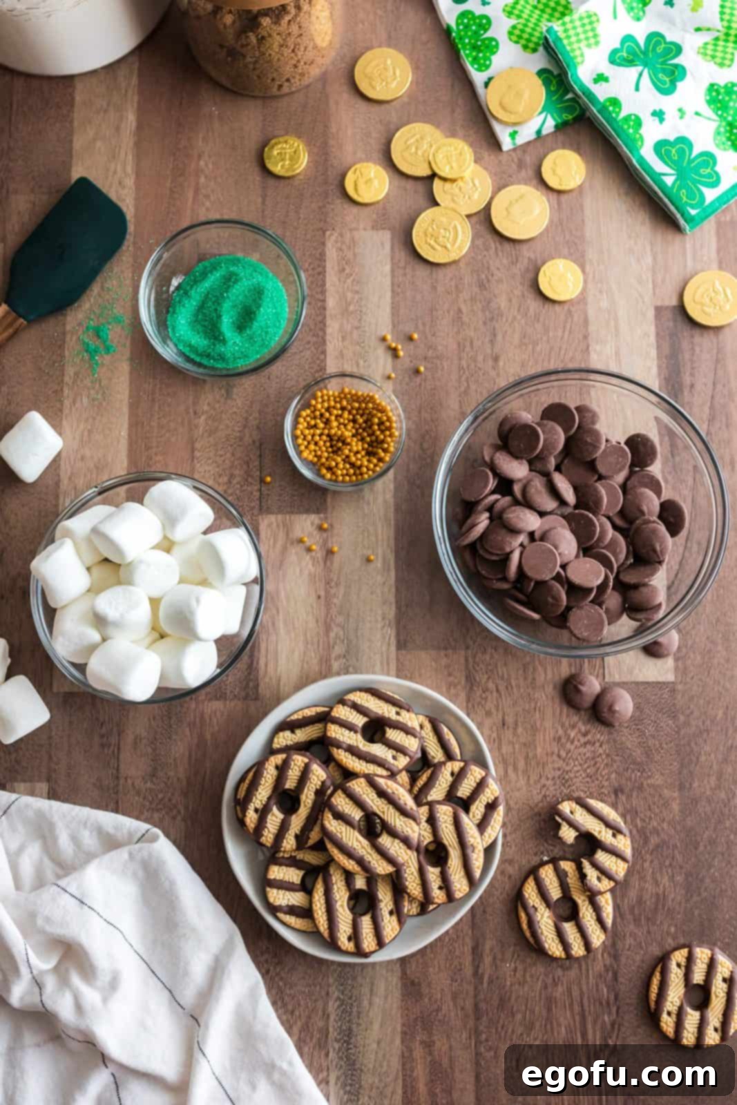 Ingredients needed: fudge-stripe cookies, marshmallows, melting chocolate and sprinkles.