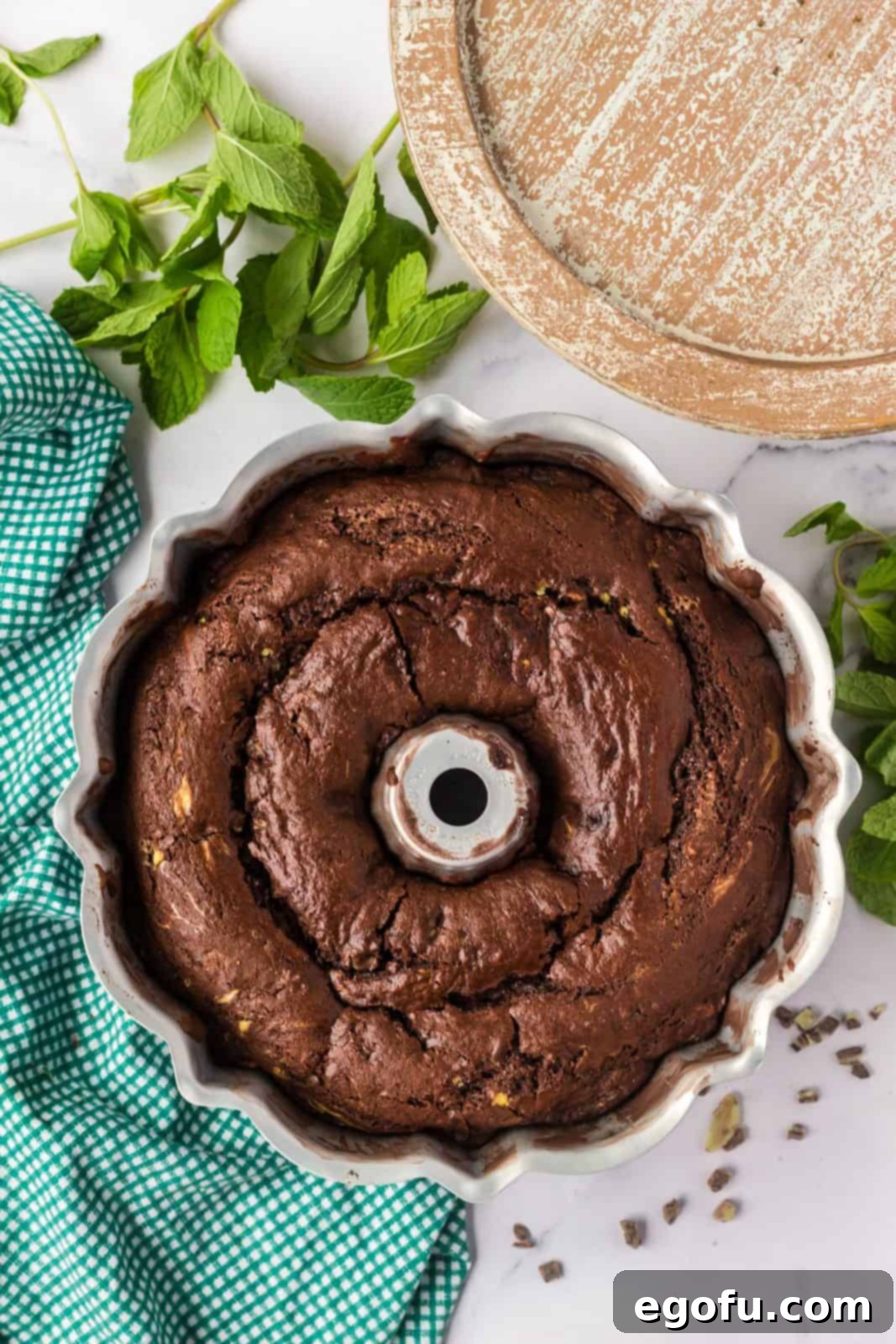 Finished cake out of oven cooling in bundt pan.