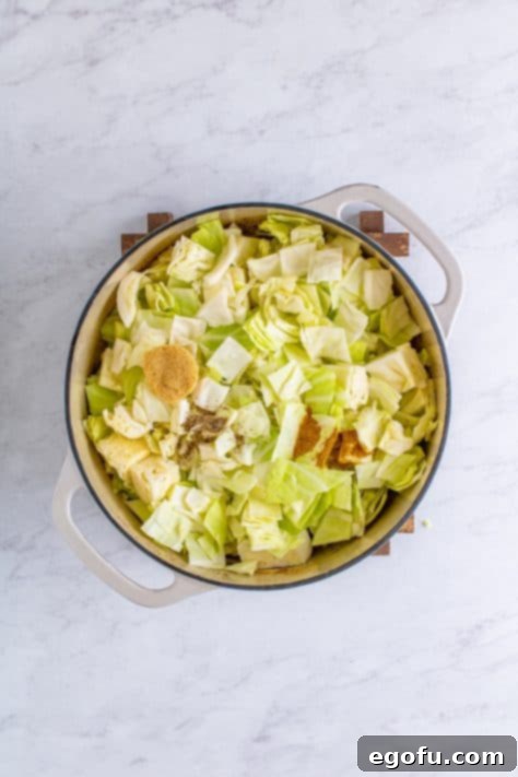 Crispy Bacon and Caramelized Cabbage 12 cabbage and seasonings added to dutch oven.