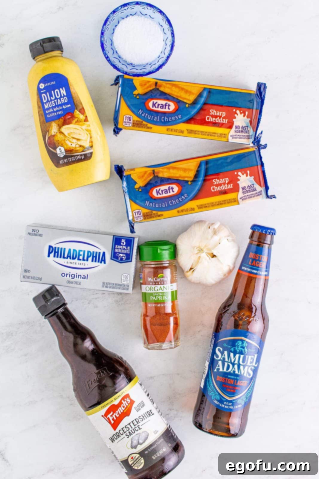 Ingredients needed: sharp cheddar cheese, cream cheese, garlic, worcestershire sauce, dijon mustard, smoked paprika, beer and kosher salt.