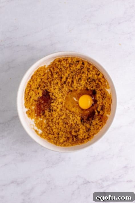 Vanilla and eggs added one at a time to the brown sugar mixture.