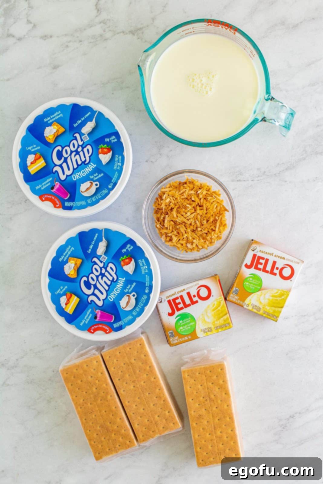 Ingredients needed: instant coconut cream pudding mix, whole milk, whipped topping, graham crackers and toasted coconut.