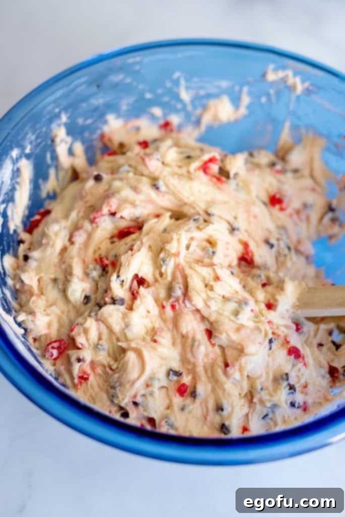 Chocolate chips and cherry chunks folded into batter.