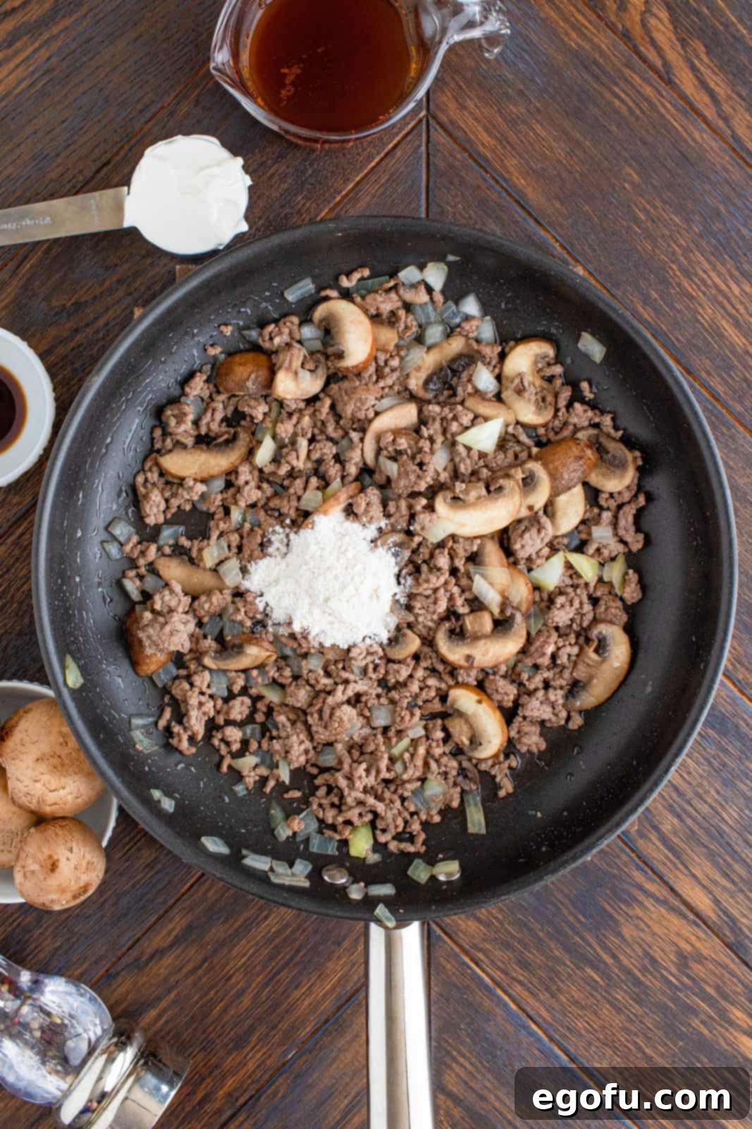 Flour added to ground beef mixture.