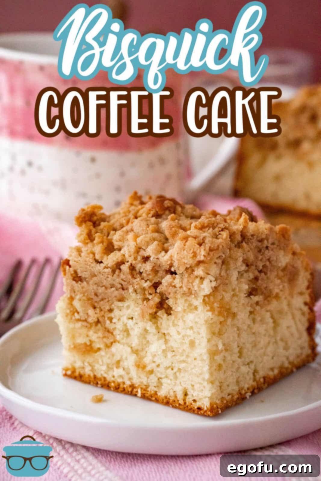 A perfectly baked slice of Bisquick Coffee Cake on a pristine white plate, ready to be enjoyed.