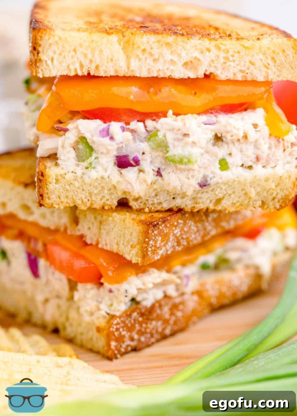 Golden Grilled Tuna Melt 2 Stacked cut Classic Tuna Melt on top of eachother showing layers.