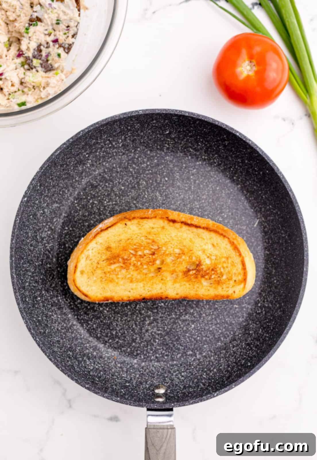 Golden Grilled Tuna Melt 9 Second half of bread placed on top of sandwich toasted.