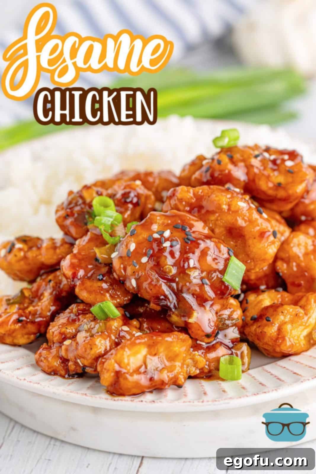 Close up of Easy Sesame Chicken on white plate with rice Pinterest image.