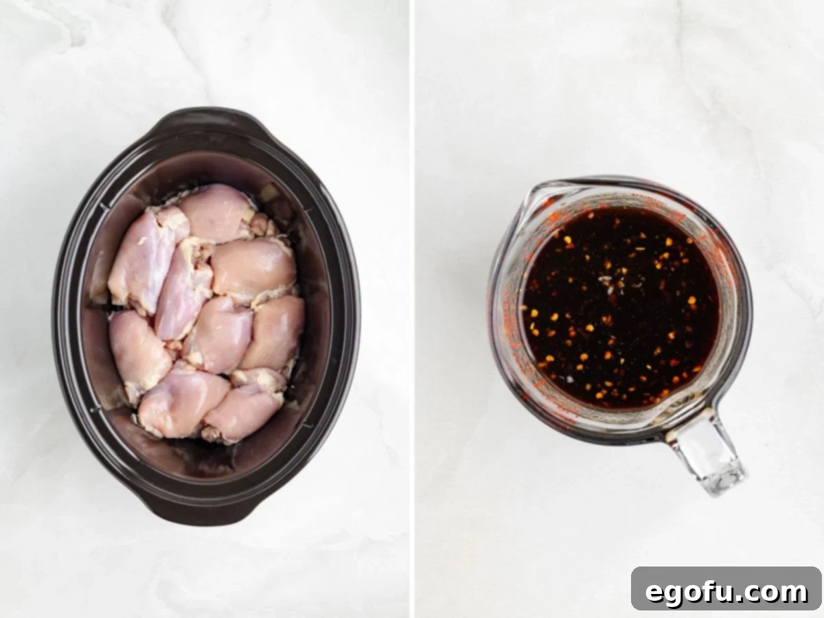 Raw chicken in a slow cooker alongside a measuring cup filled with soy sauce, honey, ketchup, garlic, ginger, sesame oil, and crushed red pepper flakes, ready to be combined.