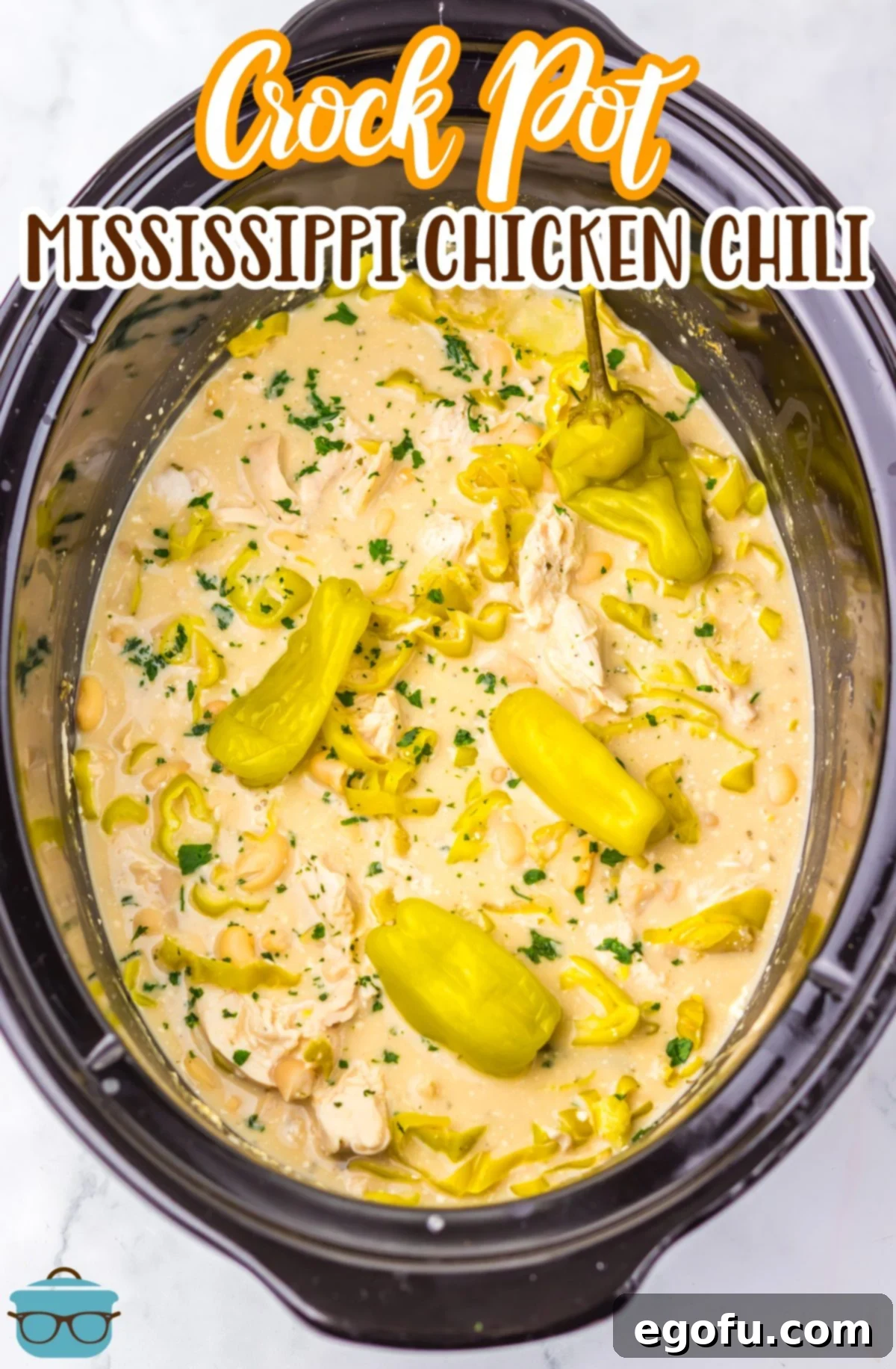 A slow cooker brimming with freshly made Mississippi Chicken Chili.