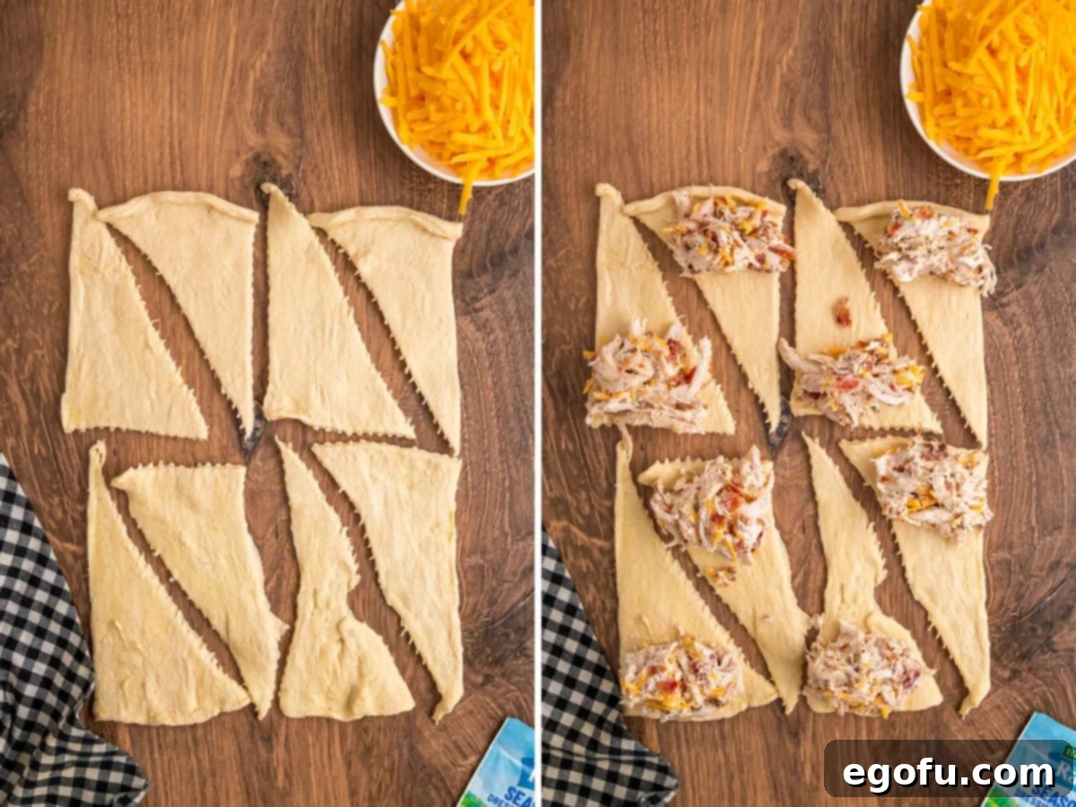 Cheesy Chicken Crescents 7 Crescent roll dough cut into triangles with some of the chicken mixture.