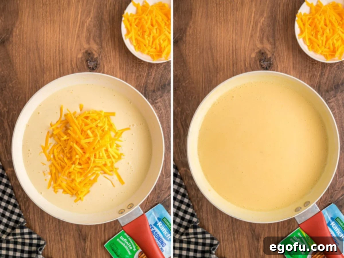 Cheesy Chicken Crescents 10 Shredded cheese being added to a cream sauce in a pan.