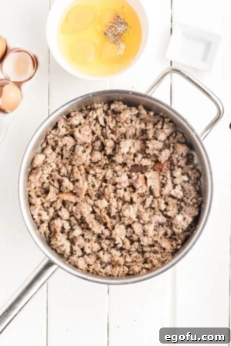 McGriddle Muffins
McMuffin Magic: Sweet & Savory Bites 11 Cooked sausage in a skillet, crumbled and ready to be added to the muffin batter.