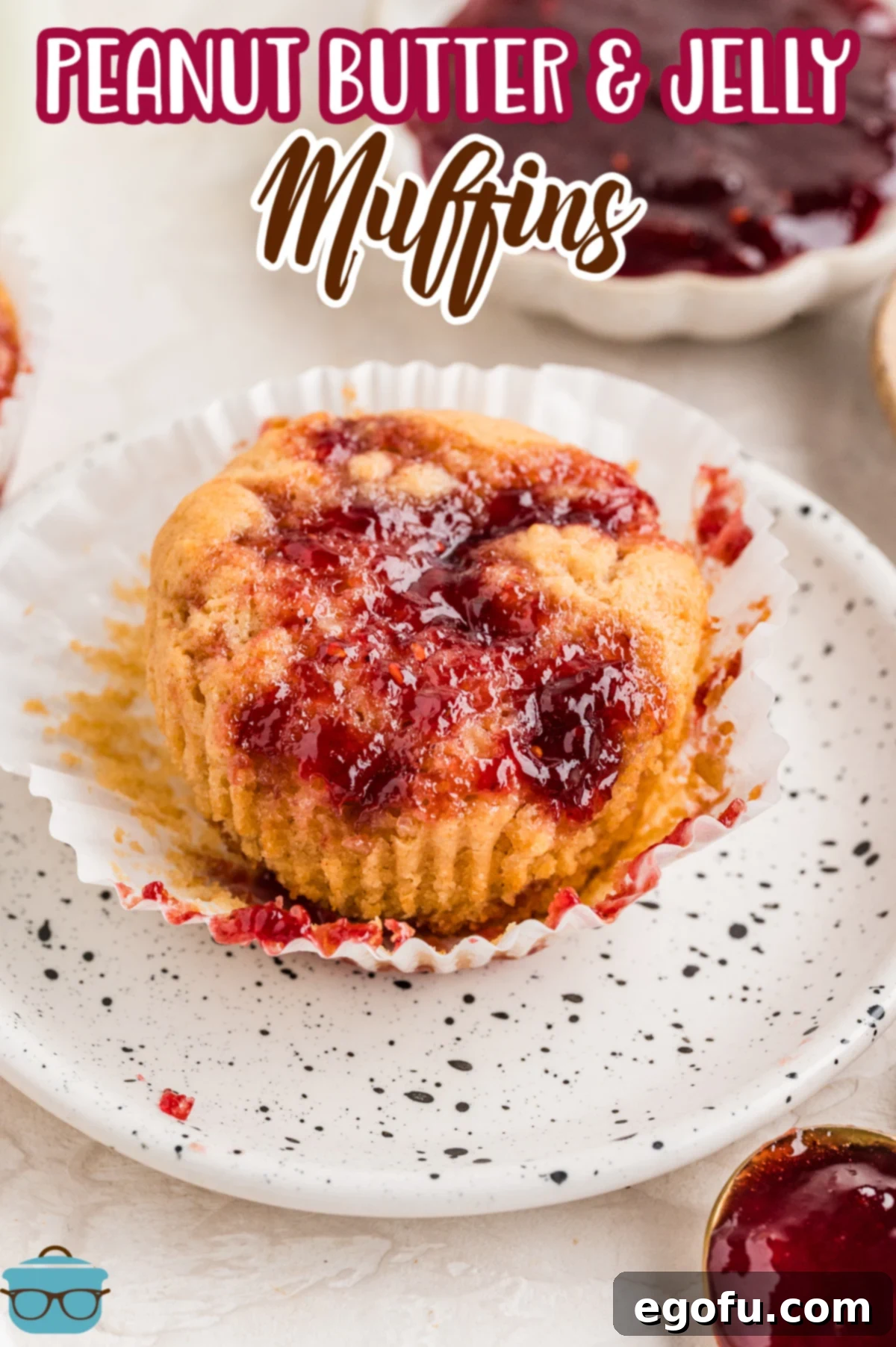 Peanut Butter & Jelly Swirl Muffins 3 A homemade Peanut Butter and Jelly Muffin on a plate.