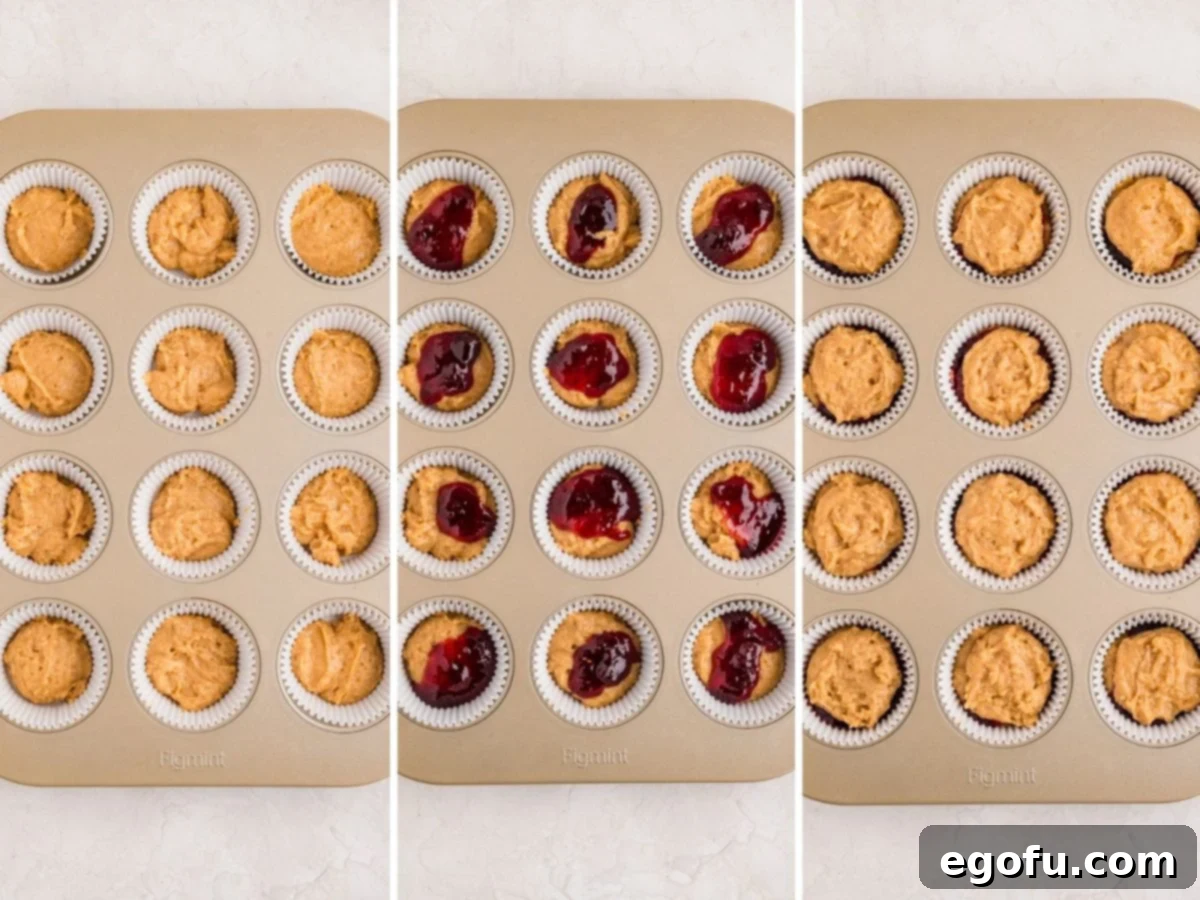 Peanut Butter & Jelly Swirl Muffins 7 Batter and jelly in a lined muffin tin